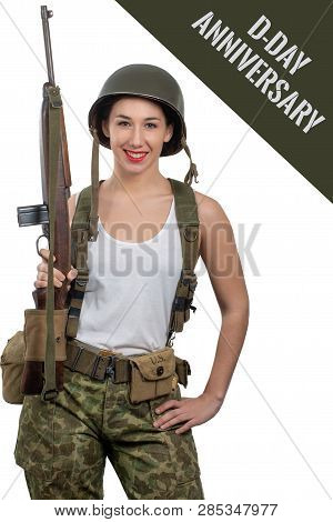 Pretty Young Woman Dressed In Wwii Military Uniform With A Helmet And Rifle