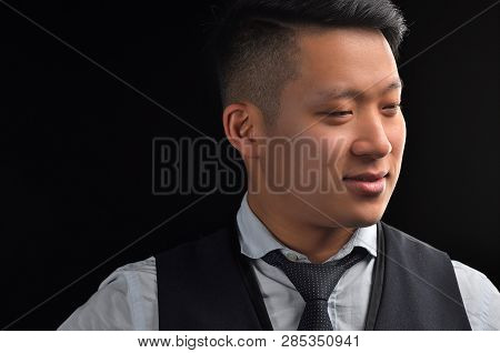 Portrait Of An Asian Young Man In A Shirt With A Stylish Hairstyle