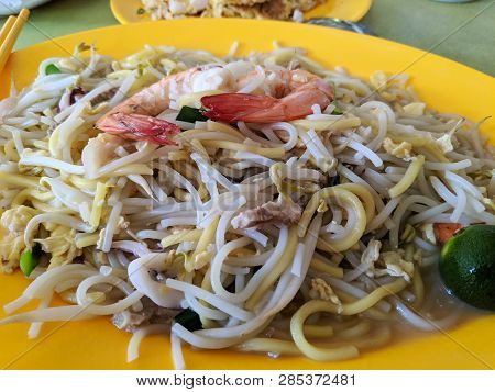 Hokkien Mee Stir Fry Noodles With Calamari Prawns Squid And Pork Closeup