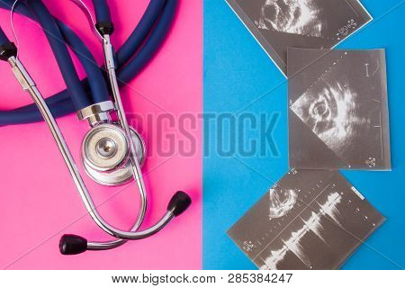 Imaginery Of Ultrasound Test Or Examinations And Medical Stethoscope In Two Colors Background: Blue 