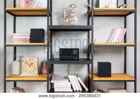 Compact Cd Radio Player On The Shelf In The Vintage Interior Of The Living Room