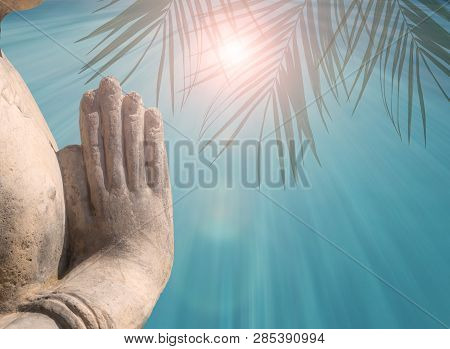 Hand Gestures Of Sun Salutations Namaskara By Buddha On Blue Background With Rays And Palm Leaves. C
