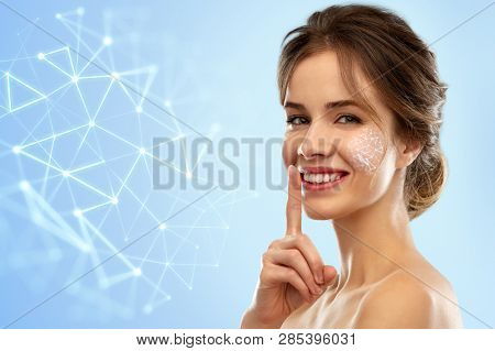 beauty secret, science and future technology concept - beautiful smiling woman making hush gesture over blue background and low poly grid