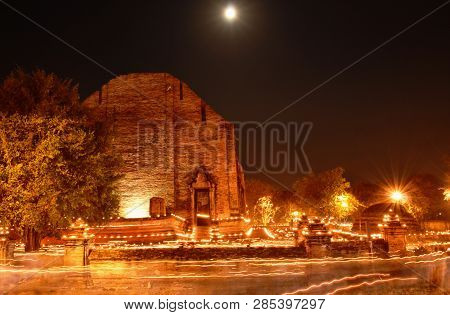 Candlelight Procession On Buddhist Day At Mahaeyong Temple In Thailand