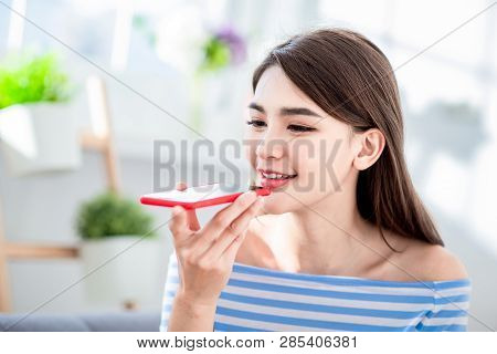 Asian Woman Use Ai Vocal Assistant By Smart Phone
