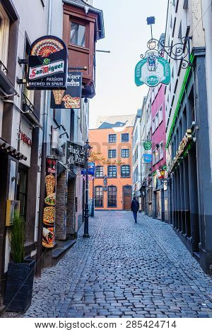 Narrow Alley In The Historic Old Town Of Cologne, Germany