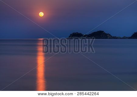 Full Moon (super Moon) With Star Over Seascape In Night Skies. Thassos Island, Greece