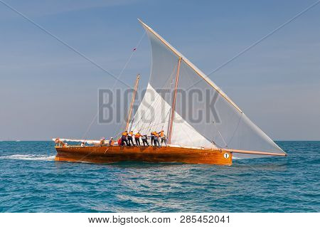 ABU DHABI, UAE - FEBRUARY 10, 2018: Sailing dhow race back to Abu Dhabi at 60 Feet Dhow Sailing Race