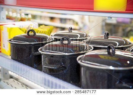 Black Enameled Pans With Lid In The Store.