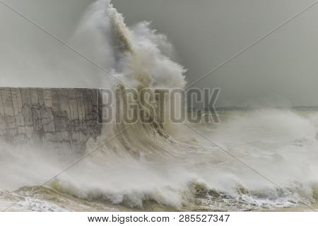 Stunning Waves Crashing Over Harbor Wall During Windy Storm At Newhaven On English Coast