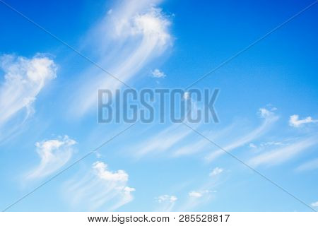 Amazing White Clouds On A Blue Sky Background. Clouds Like A Brush Strokes