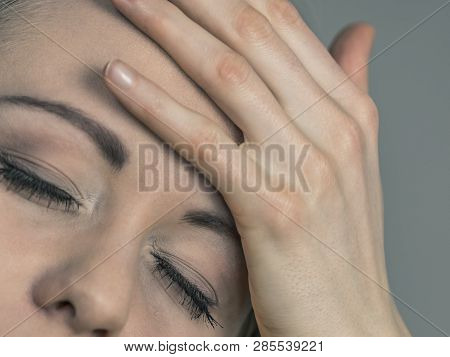 Young Blonde Woman Having Serious Migrene Suffering From Horrible Head Ache Feeling Big Pain.