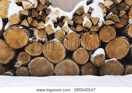 Stacks Of Firewood. Preparation Of Firewood For The Winter. Pile Of Firewood.firewood Background.pre