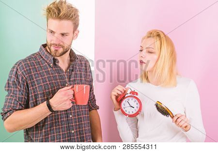 Too Early Awakening. Couple Oversleep Awakening Hold Alarm Clock. Couple Sleep Not Enough Time. Fami