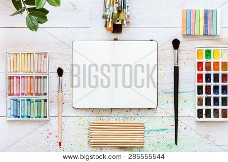 Creative Work Desk For Self-expression, Paint Brushes, Paintbox With Watercolors, Crayons, Pencils A