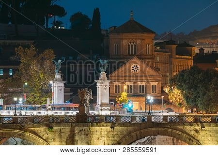 Rome, Italy. Hospital Of Holy Spirit And Aelian Bridge In Evening Night Illuminations.