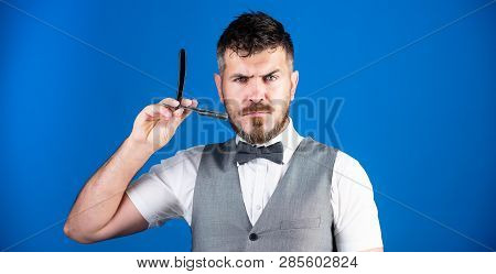 Sharp Razor. Bearded Man With Straight Razor In Barbershop. Brutal Man With Beard Holding Shave Razo