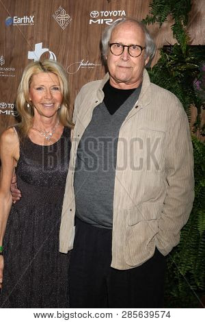LOS ANGELES - FEB 20:  Jayni Luke, Chevy Chase at the Global Green 2019 Pre-Oscar Gala at the Four Seasons Hotel on February 20, 2019 in Beverly Hills, CA