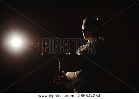 Young Girl Dressed In Hakama Practicing Aikido