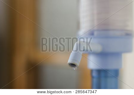 A Drop Of Water On The Pump On A Light Background With Space For Text. Concept Drought And Crisis En