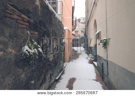 winter street in Adrano Old Town, Sicily