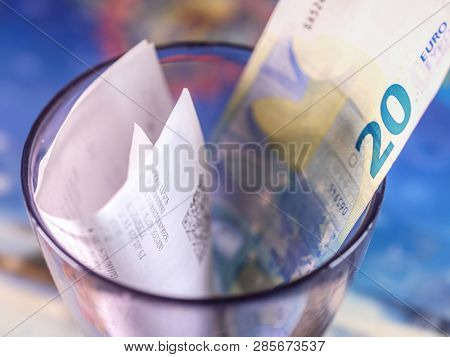 Moscow, Russia - February 20, 2018: The image of tips in a glass in Moscow restaurant