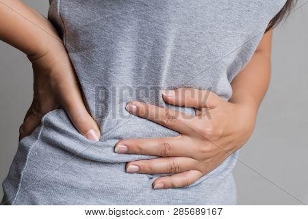 Young Woman Having Painful Stomachache. Chronic Gastritis. Abdomen Bloating And Healthcare Concept.