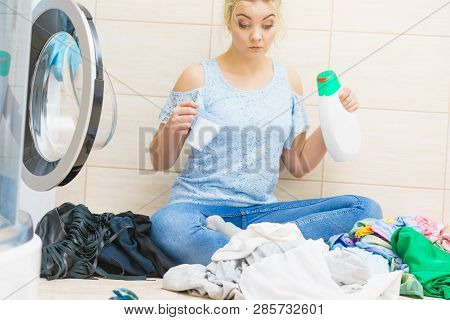 Woman Choosing Laundry Detergent