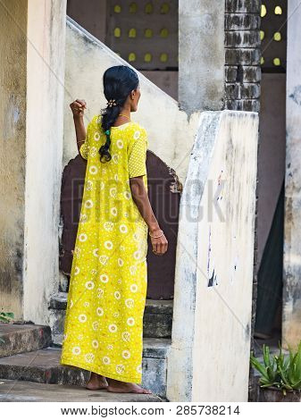 Puduchery, India - December Circa, 2018. Unidentified Young And Elegant Woman In Indian Yellow Sari 