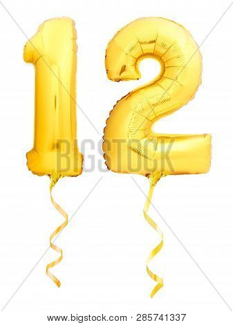 Golden Number 12 Twelve Made Of Inflatable Balloon With Golden Ribbon On White