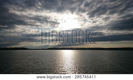 Blue Sky And Blue Lake In Summer. White Clouds Are Reflected In The Water. The Famous Lake Seliger. 