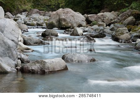 River Near Lake Tanuki, Japan. River With Bridal Veil Effect.