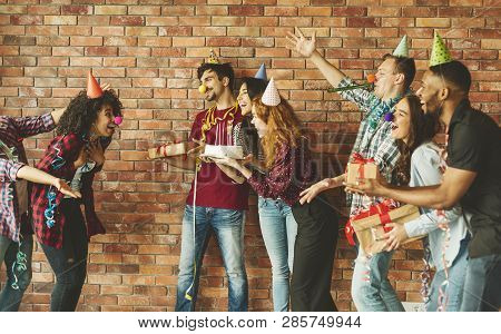 Surprised Girl With Friends On Her Birhtday Party. Surprise Party For Birthday Concept