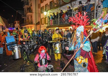 Participants In Costumes Perform A Street Procession At The Carnival