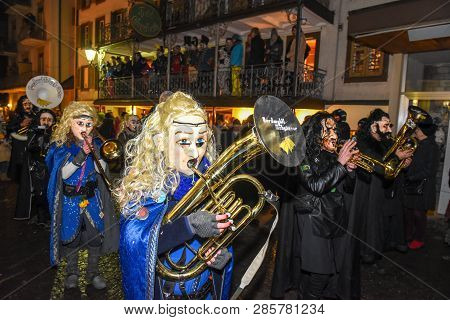 Participants In Costumes Perform A Street Procession At The Carnival