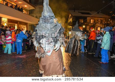 Participants In Costumes Perform A Street Procession At The Carnival