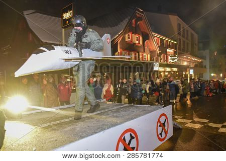 Participants In Costumes Perform A Street Procession At The Carnival