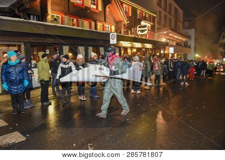 Participants In Costumes Perform A Street Procession At The Carnival