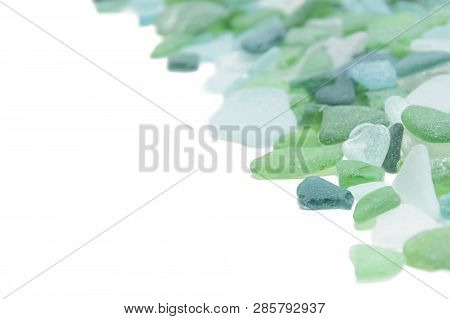 Green Glass Stones On A White Isolated Background, Copy Space, Vacation Concept