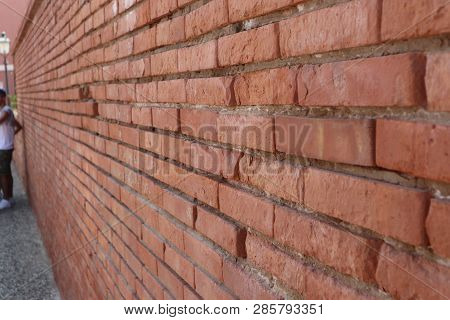 Dirty Red Brick Wall. Old Brick Wall Texture Background. Briks Close-up.
