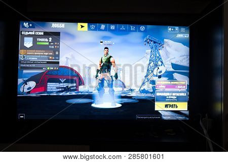 Tula, Russia - January 27, 2019 - Fortnite Video Game Screen With Character And Console Controller. 