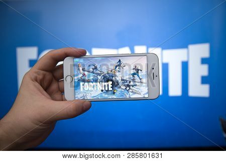 Tula, Russia - January 27, 2019 - Fortnite Video Game Screen With Character And Console Controller. 