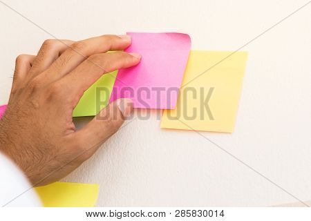 Business People Hands Post Sticky Note Paper On Glass Reminder Schedule Board For Meeting At Office 