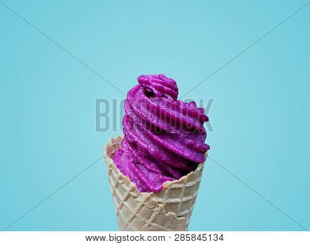 Violet Ice Cream Cone Isolated On Light Blue Pastel Background. Violet Ice Cream Made By Jambolan Or