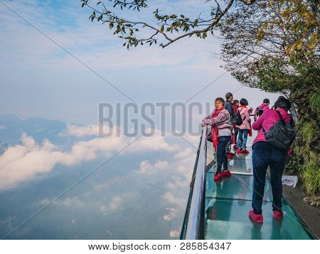 Zhangjiajie/china - 15 October 2018:unacquainted Tourists On Glass Cliff Walk In Tianmen Mountain At