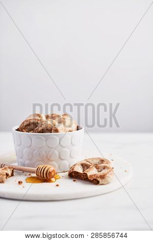 Traditional Chtristmas Gingerbread Cookies Made Of Ginger, Honey And Cinnamon With Icing In Bowl On 