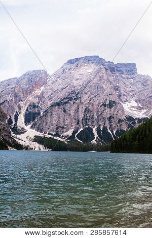 Mudflow With Snow High In The Alpine Mountains Lake, Lago Di Braies