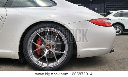 Moscow. Autumn 2018. White Porsche 911 Tuned With Bbs Wheels. Stands On The Parking.