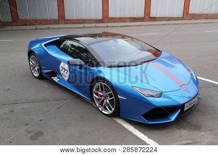 Moscow. Autumn 2018. Bright Blue Lamborghini Huracan Parked On The Street. With Red Stripe On A Car 