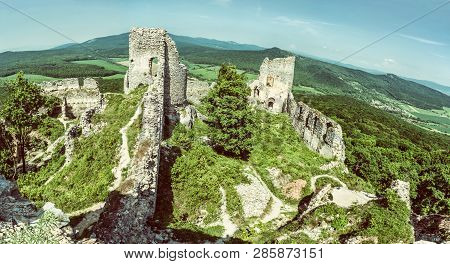 Ruins Of The Castle Gymes In Slovak Republic. Travel Destination. Panoramic Photo. Old Photo Filter.